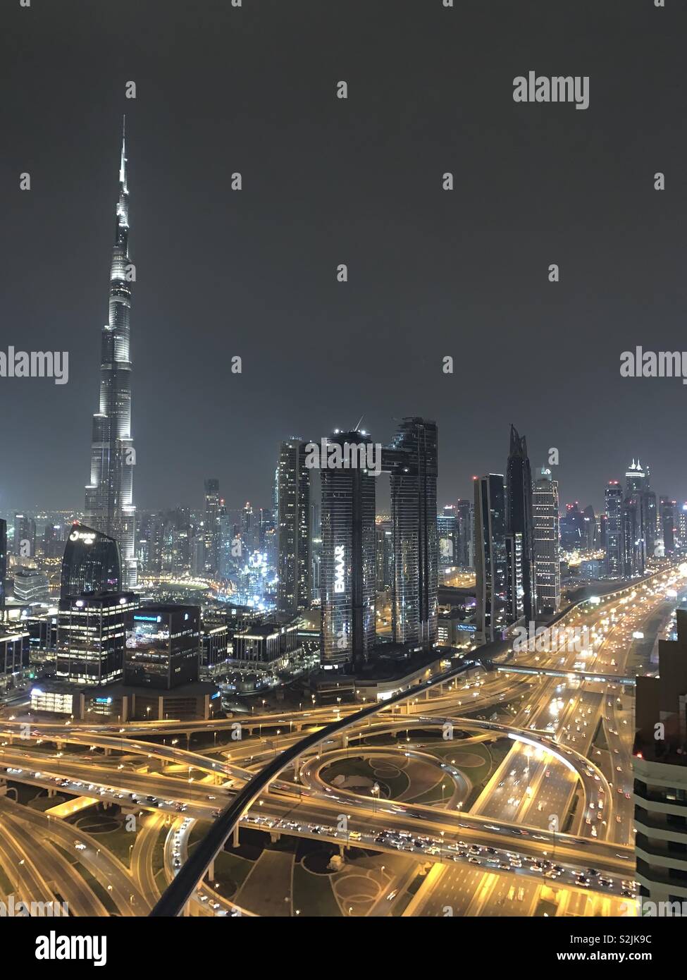 Dubai skyline at nightfall Stock Photo Alamy
