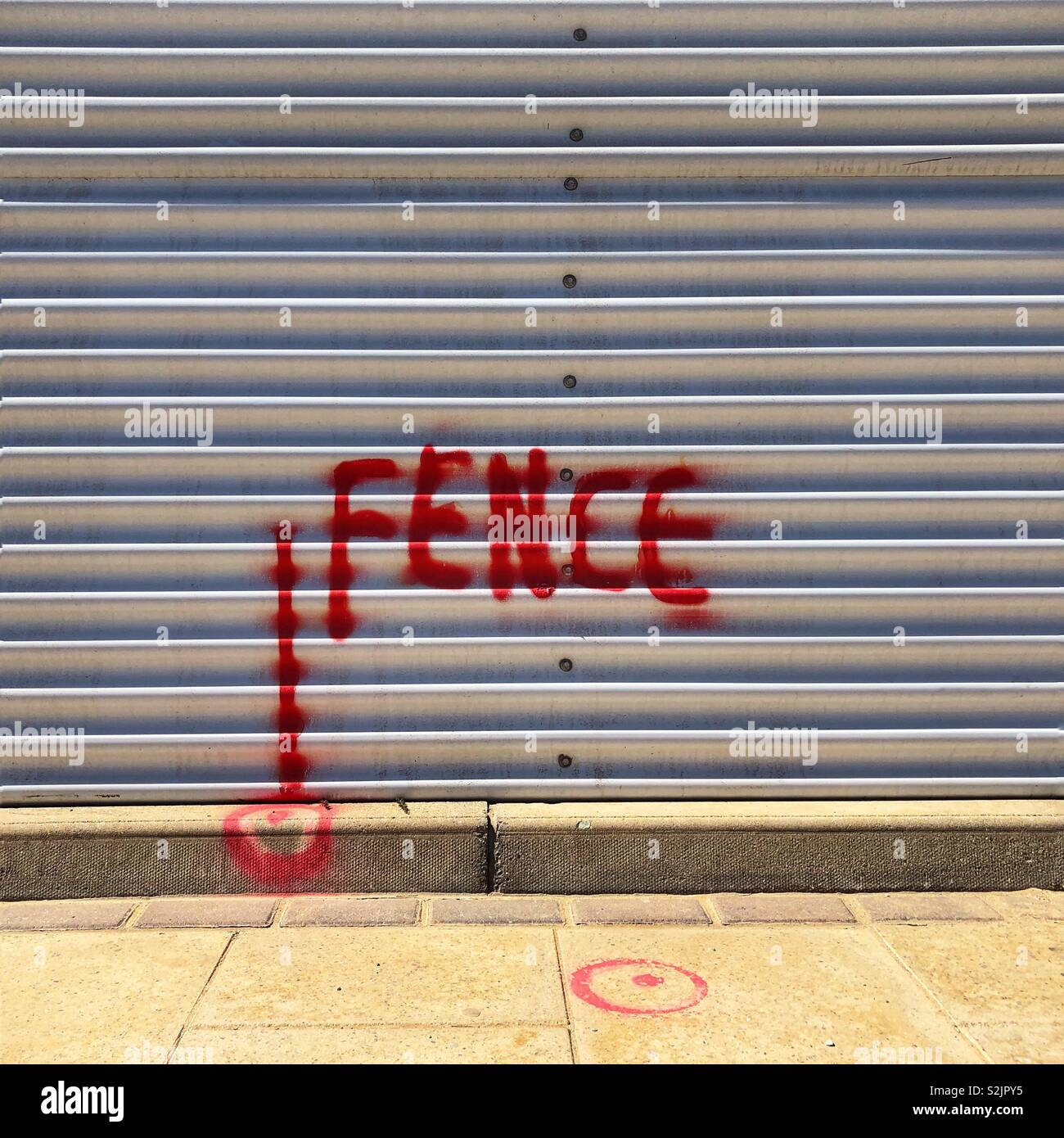 Fence painted on a fence - Smartphone Captured Stock Image