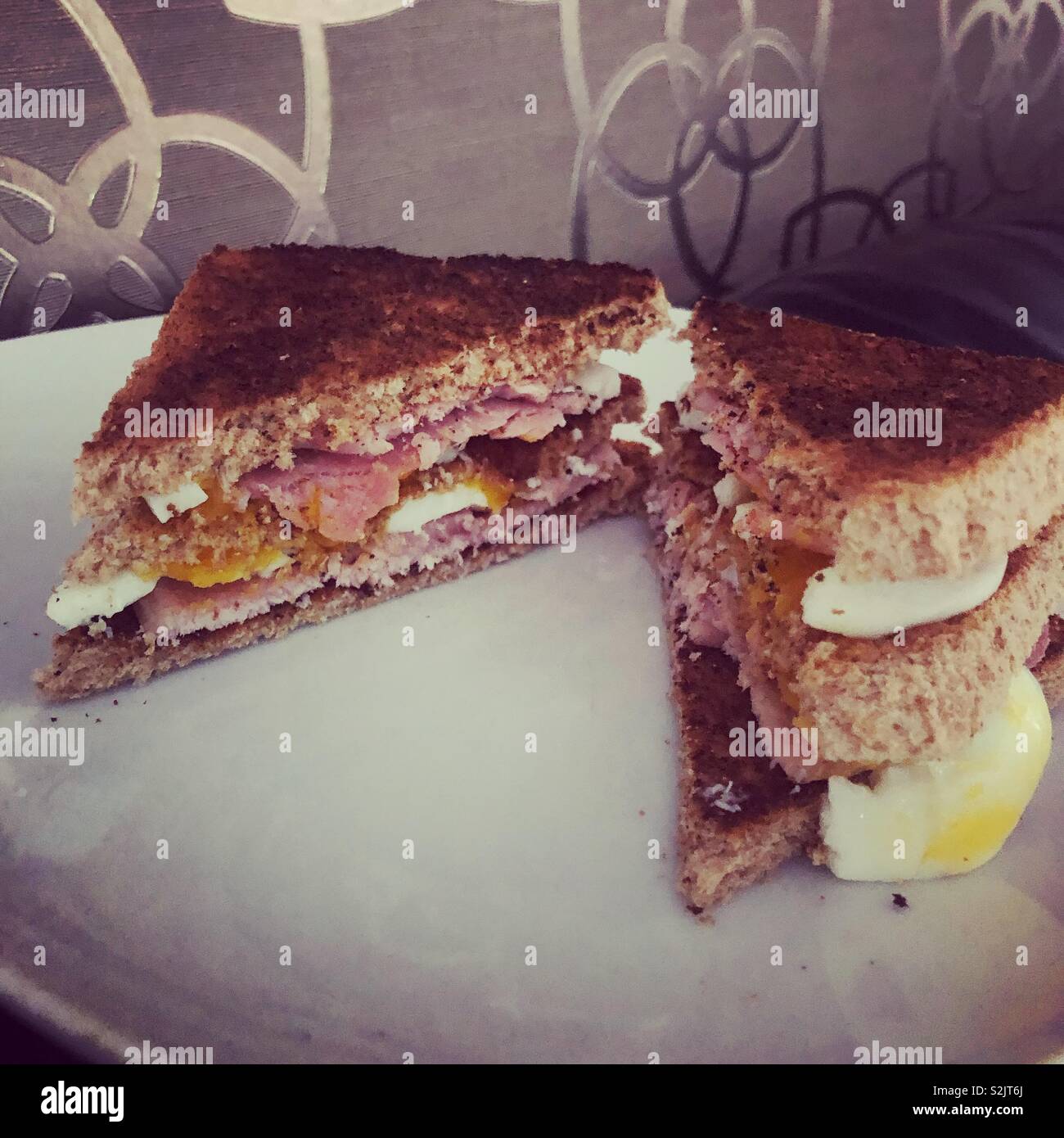 Bacon egg triple toastie Stock Photo Alamy