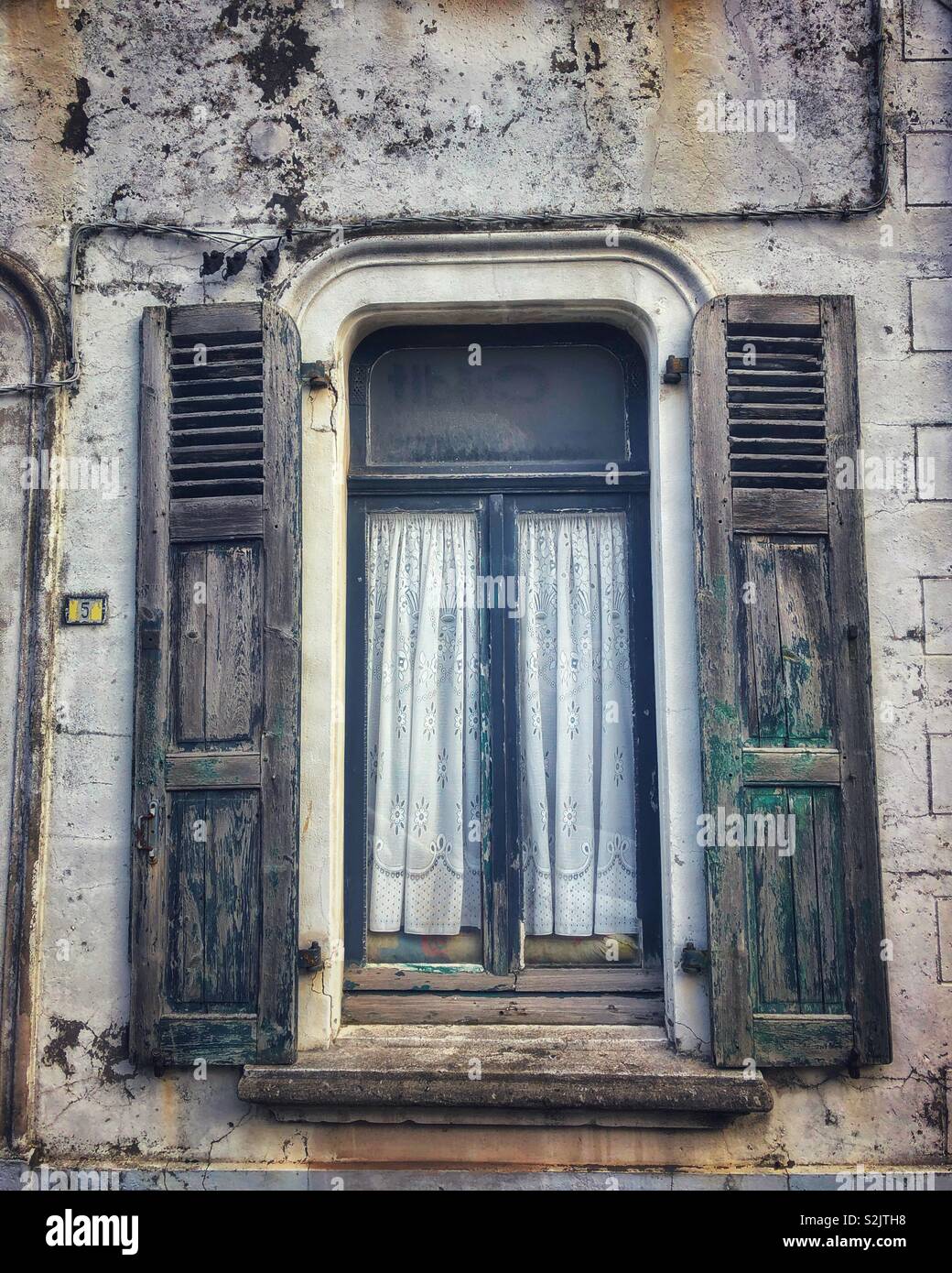 Old shuttered window on a french building Stock Photo - Alamy