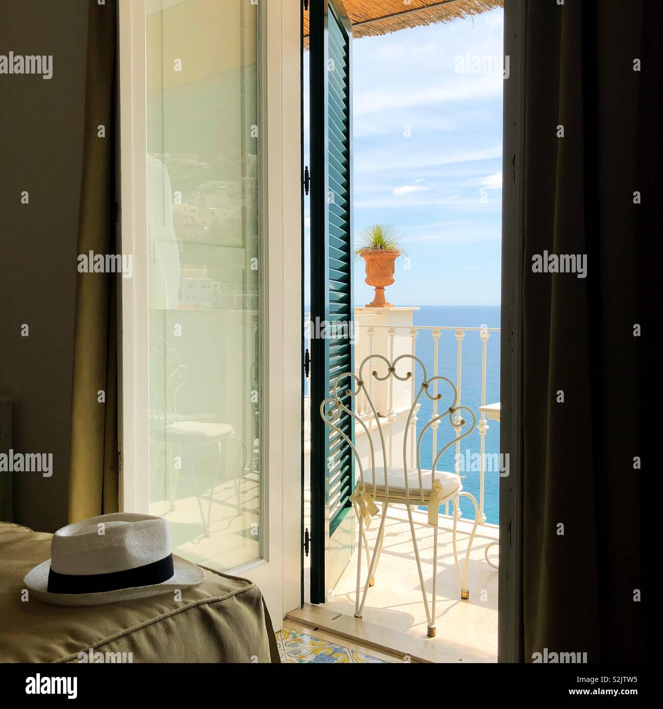 View of the Sea Mediterranean through the Open Door Stock Photo