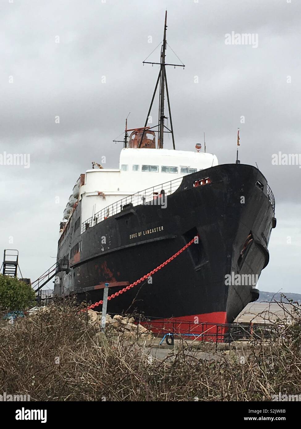 Duke Of Lancaster Abandoned Fun Ship In Llanerch Y Mor Near Mostyn Flintshire North Wales Painted Black March 2019 Stock Photo Alamy