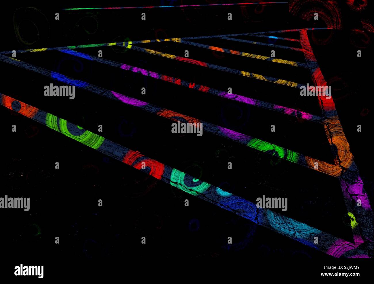 Double exposure of painted parking lot lines within a triangle and a colorful doodle - Smartphone Captured Stock Image