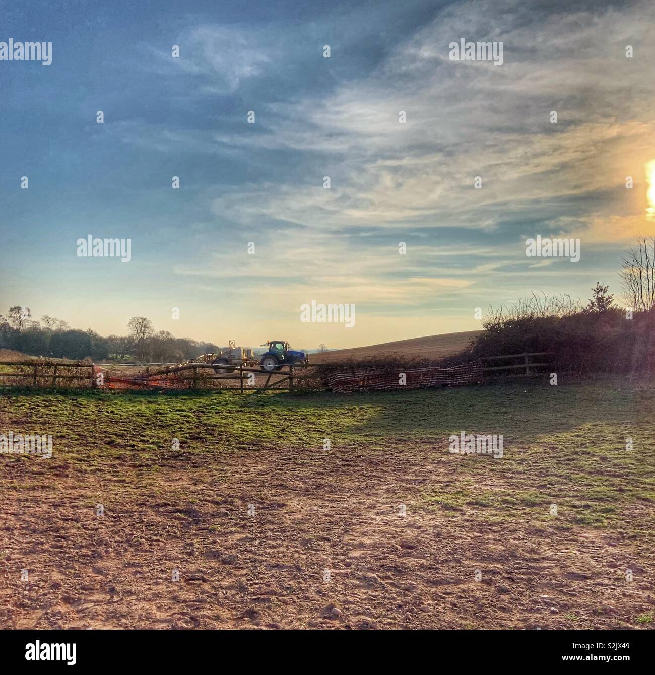 Tractor in Field - Smartphone Captured Stock Image