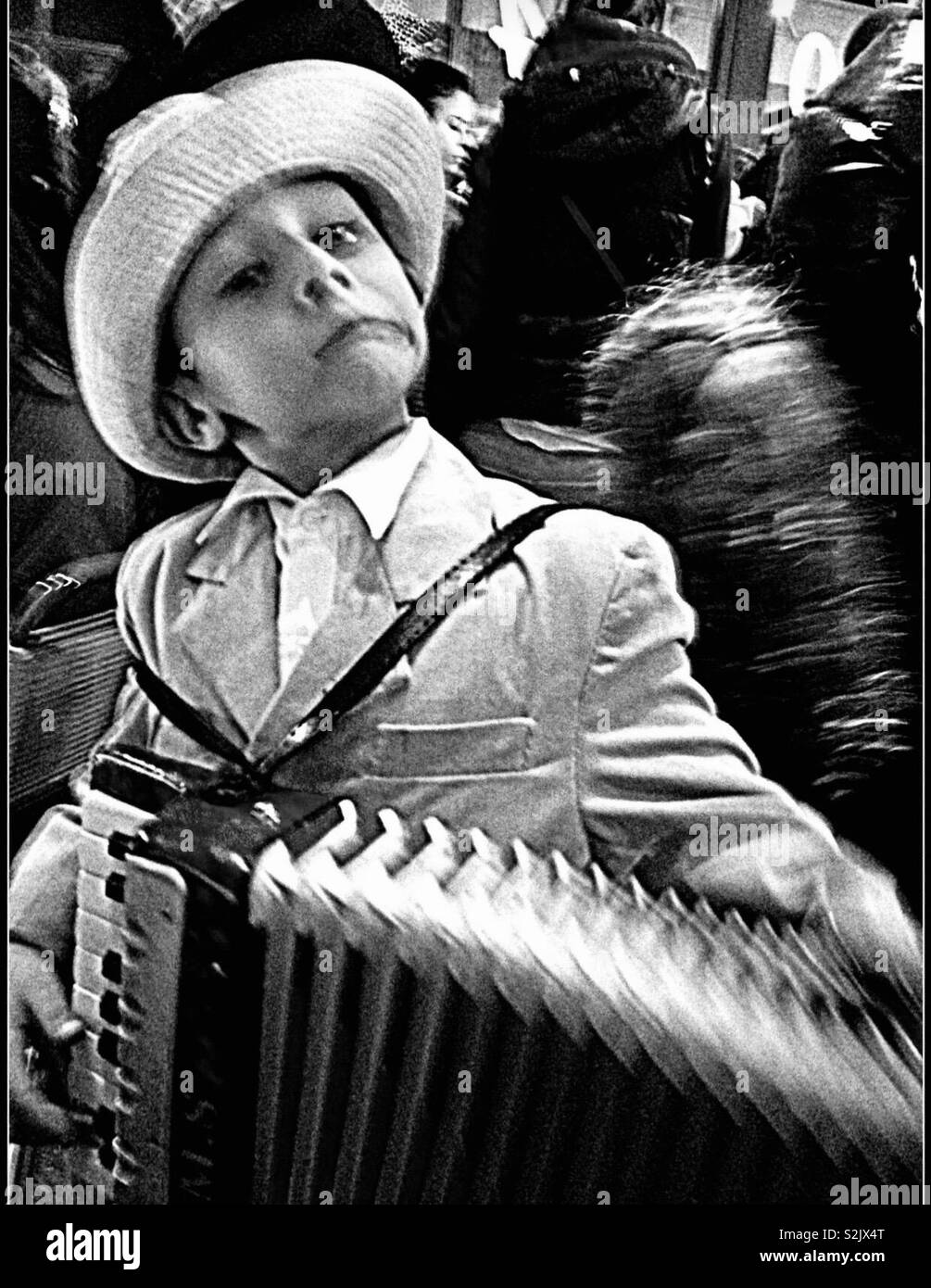 Child accordionist Street musician Stock Photo