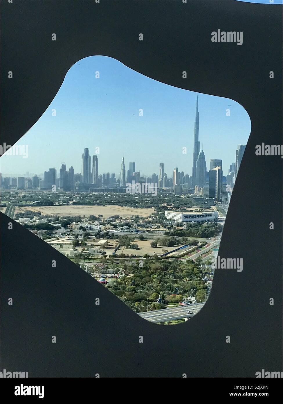 Through the window at the Dubai frame - Smartphone Captured Stock Image