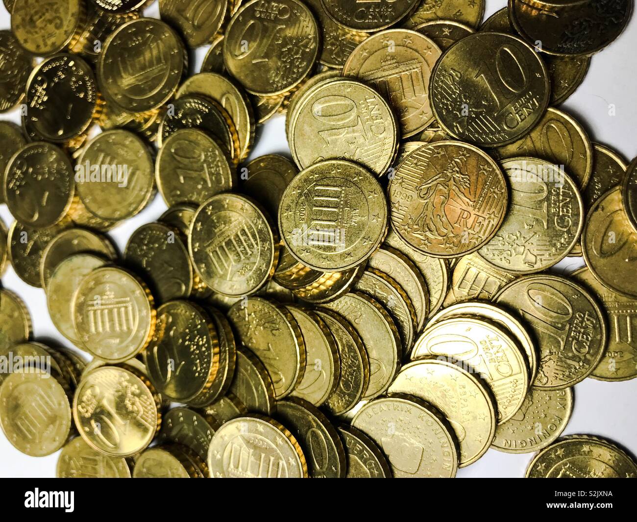 Pile of ten euro cent coins Stock Photo