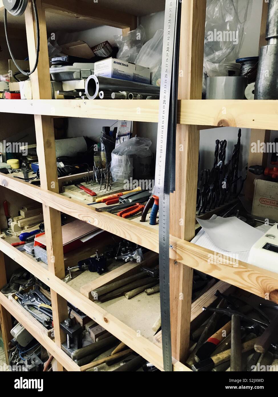 Metal Workshop Tool Shelf. Work space organizing Stock Photo