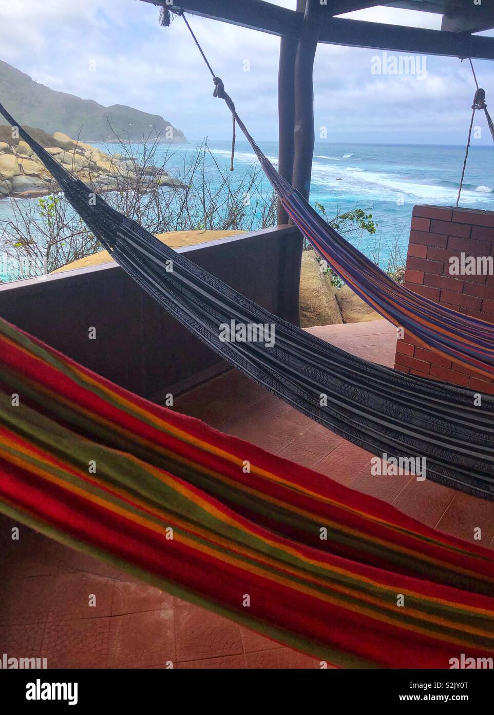 A choice of colourful hammocks to relax by the sea in Tayrona National