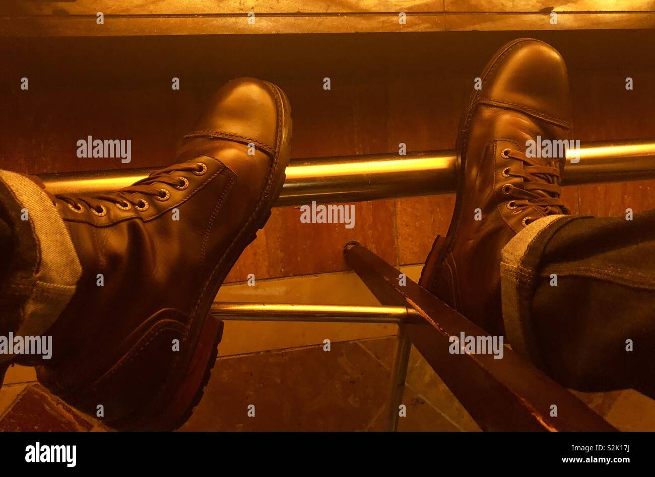 Boots at bar Stock Photo - Alamy