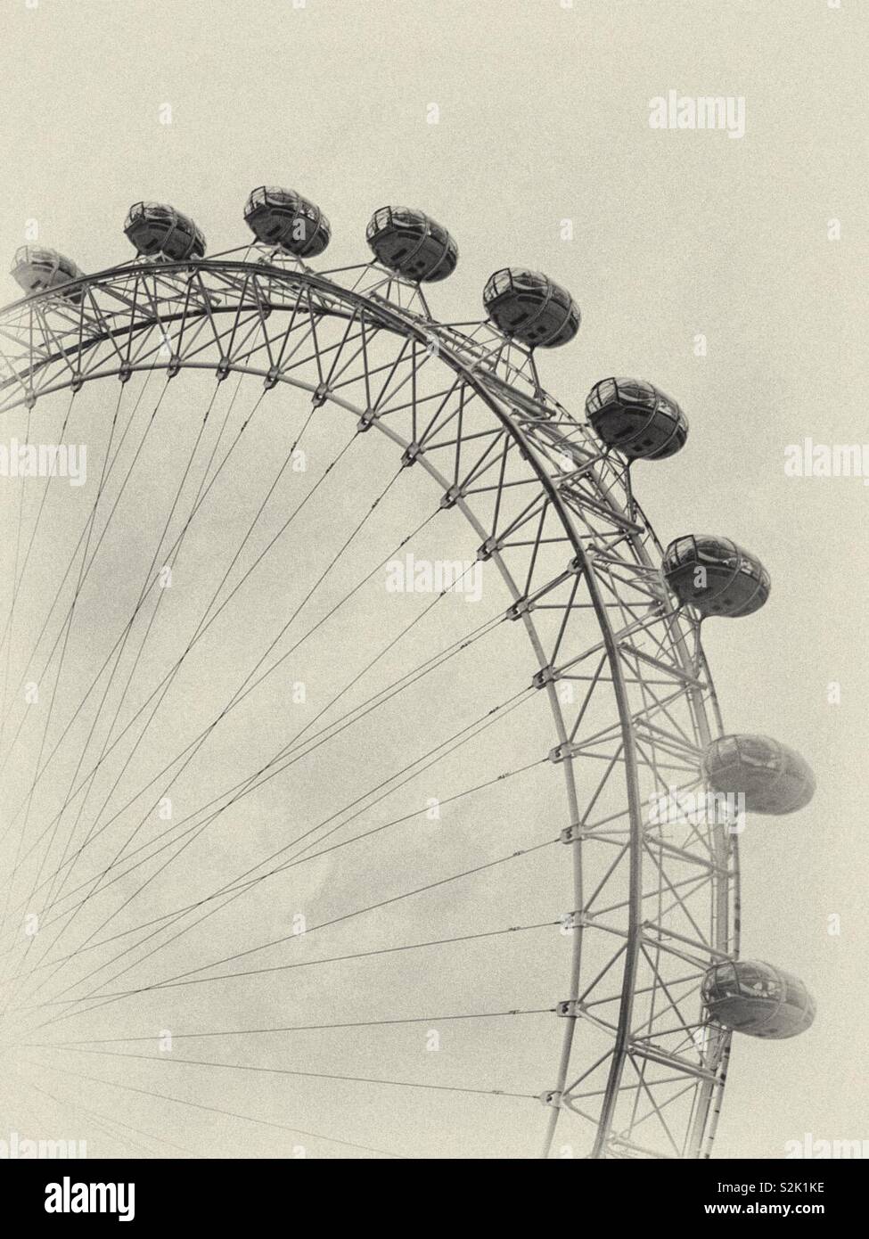 London eye.  Processed to look like a vintage photograph.  Top tourist attraction in the UK capitol.  Big wheel viewing - Smartphone Captured Stock Image