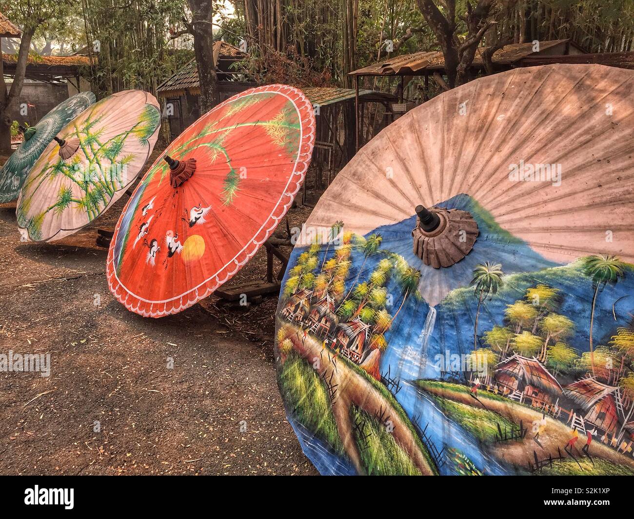 Colorful Thai umbrellas in the workshop, Chiang Mai, Thailand - Smartphone Captured Stock Image