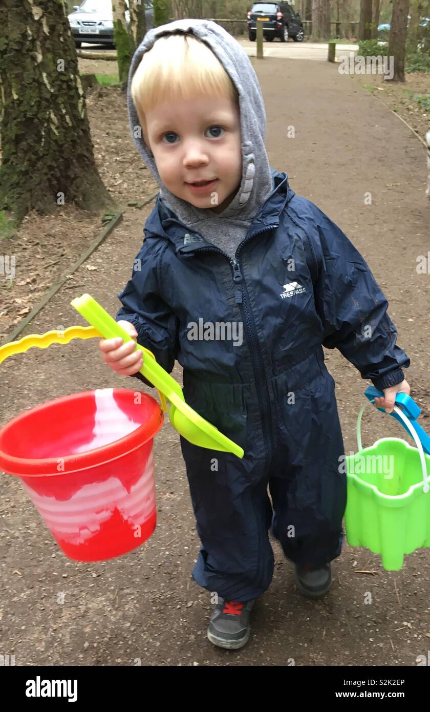 Boy with buckets and spades Stock Photo Alamy