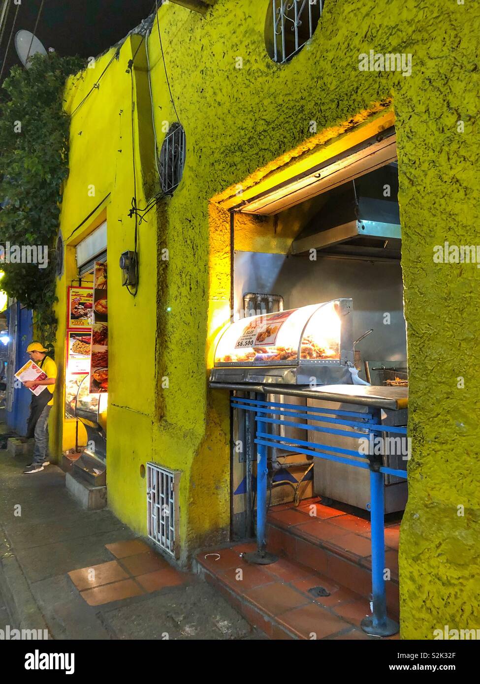 Food kiosks in Getsemani, Cartagena, Colombia at night. Stock Photo