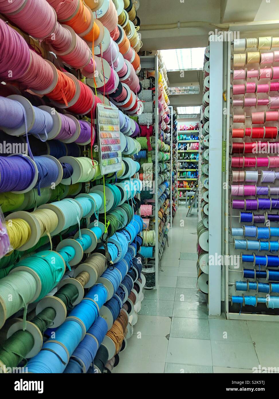 Craft Shop selling colour rainbow ribbons Stock Photo Alamy