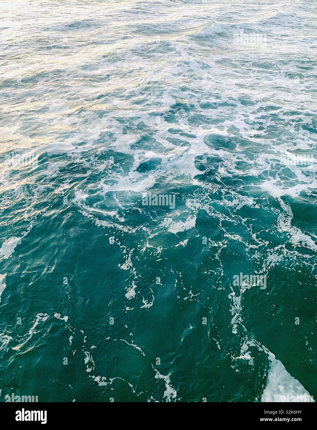 Waves and tides of the ocean. Manhattan Beach, California USA. - Smartphone Captured Stock Image