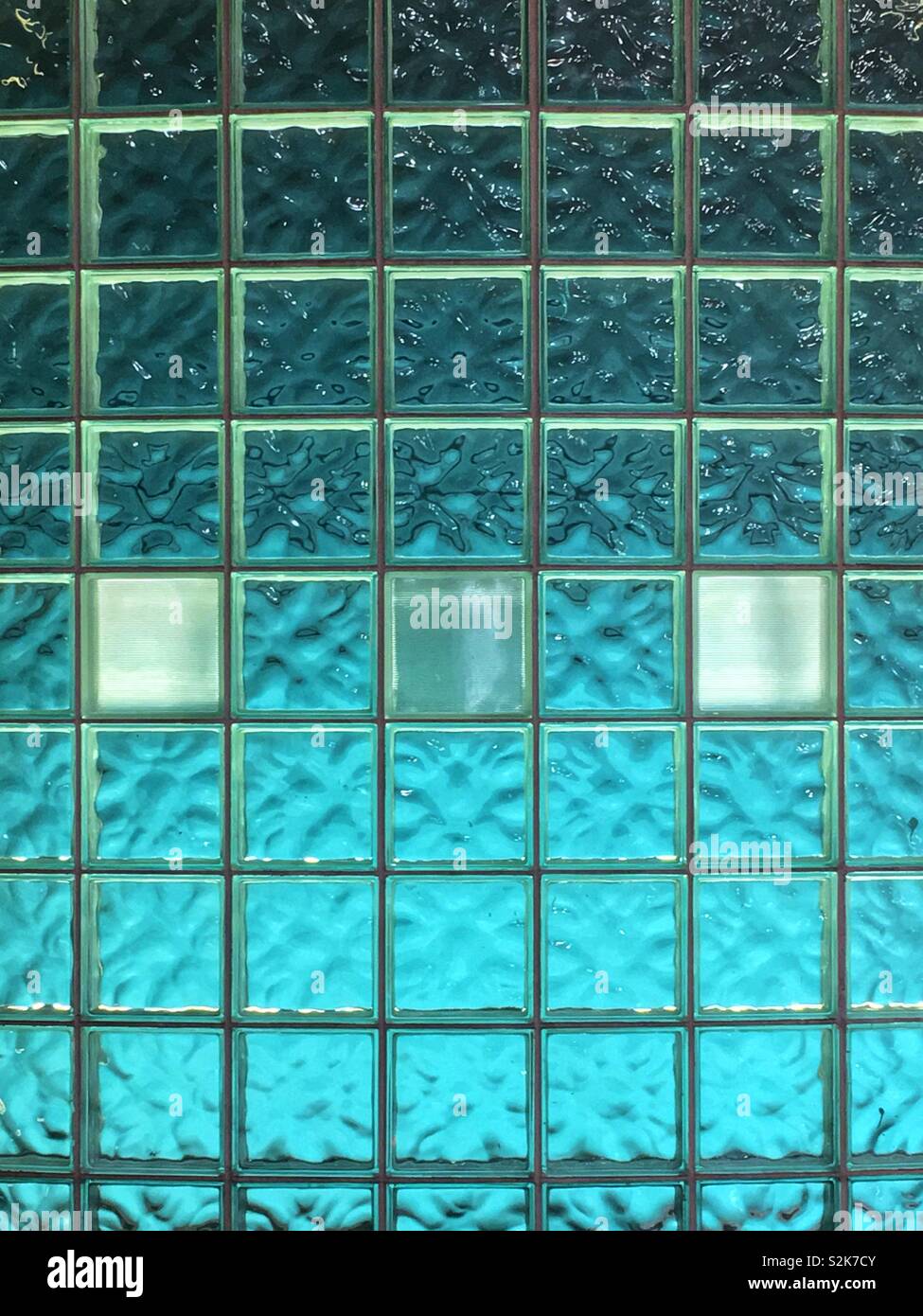 Full frame of a backlit light blue glass block wall Stock Photo Alamy