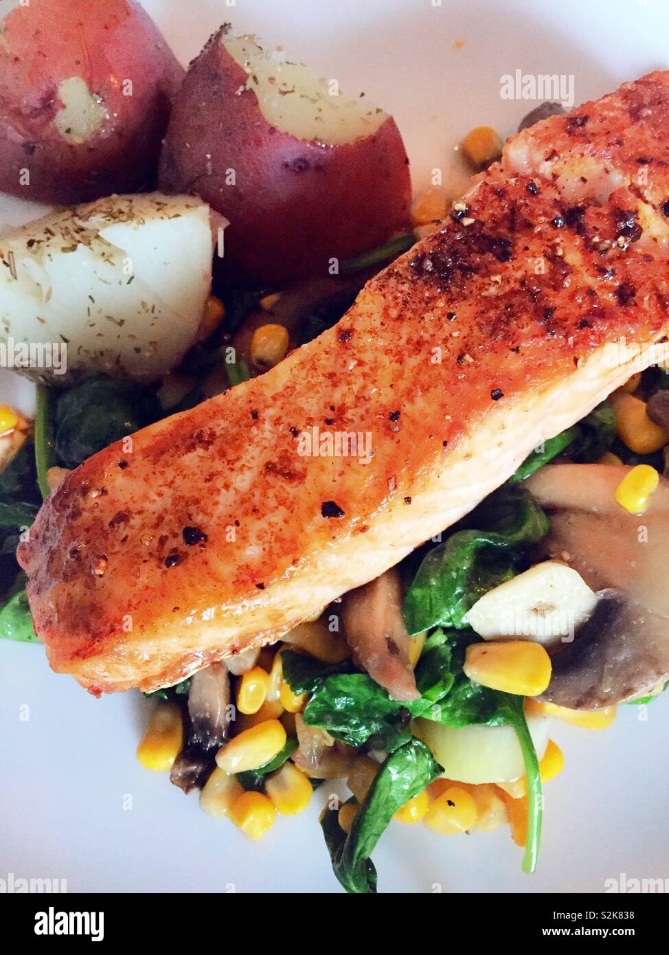 Close Up of Grilled Salmon and New Potato Entree,  USA - Smartphone Captured Stock Image