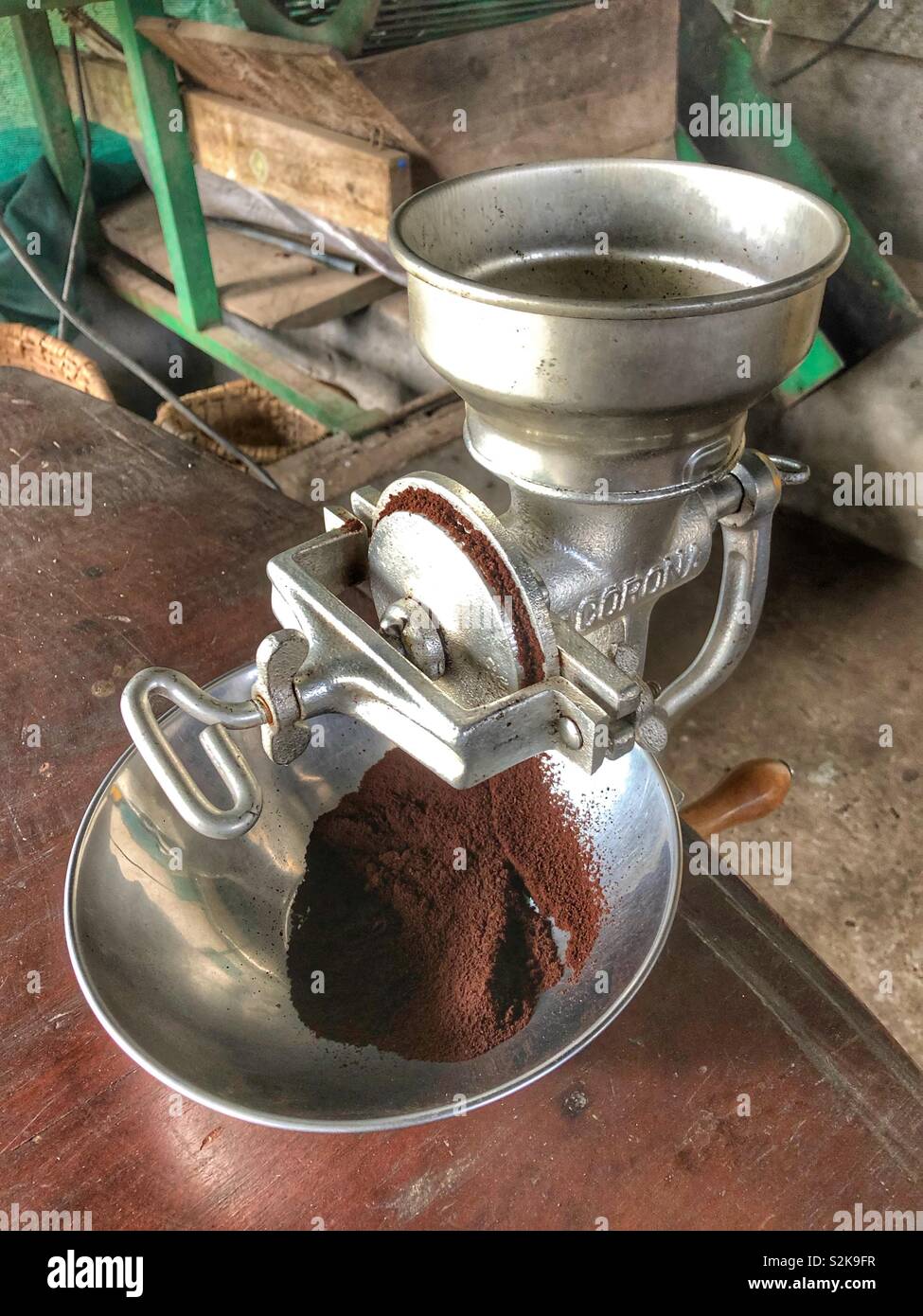 An old fashioned coffee bean grinder. - Smartphone Captured Stock Image