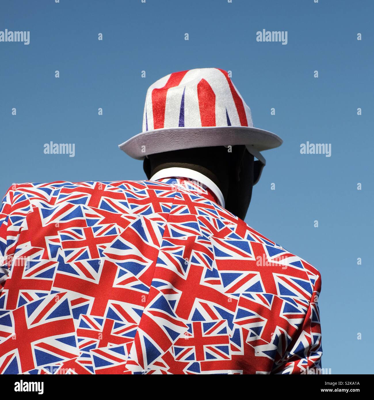 A very British man - a man wearing a Union Jack UK flag suit and hat - nationalist- patriotic jubilee celebration Stock Photo