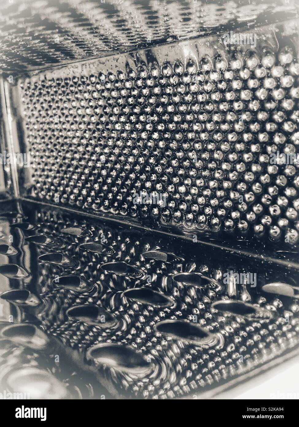 Reflections in a cheese grater - Smartphone Captured Stock Image