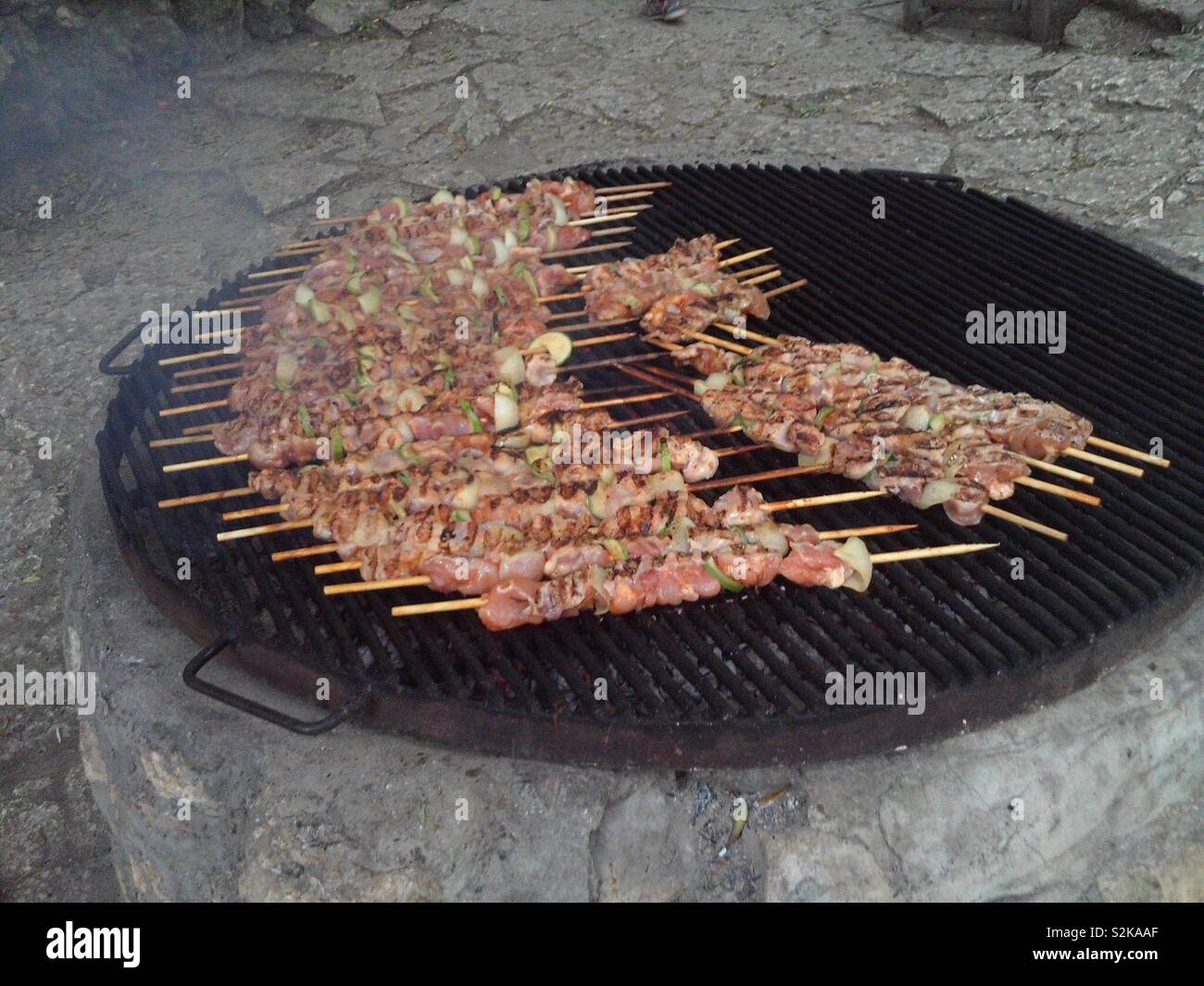 Fire Pit Grill Barbecuing Kebabs On Sticks Stock Photo 311441159