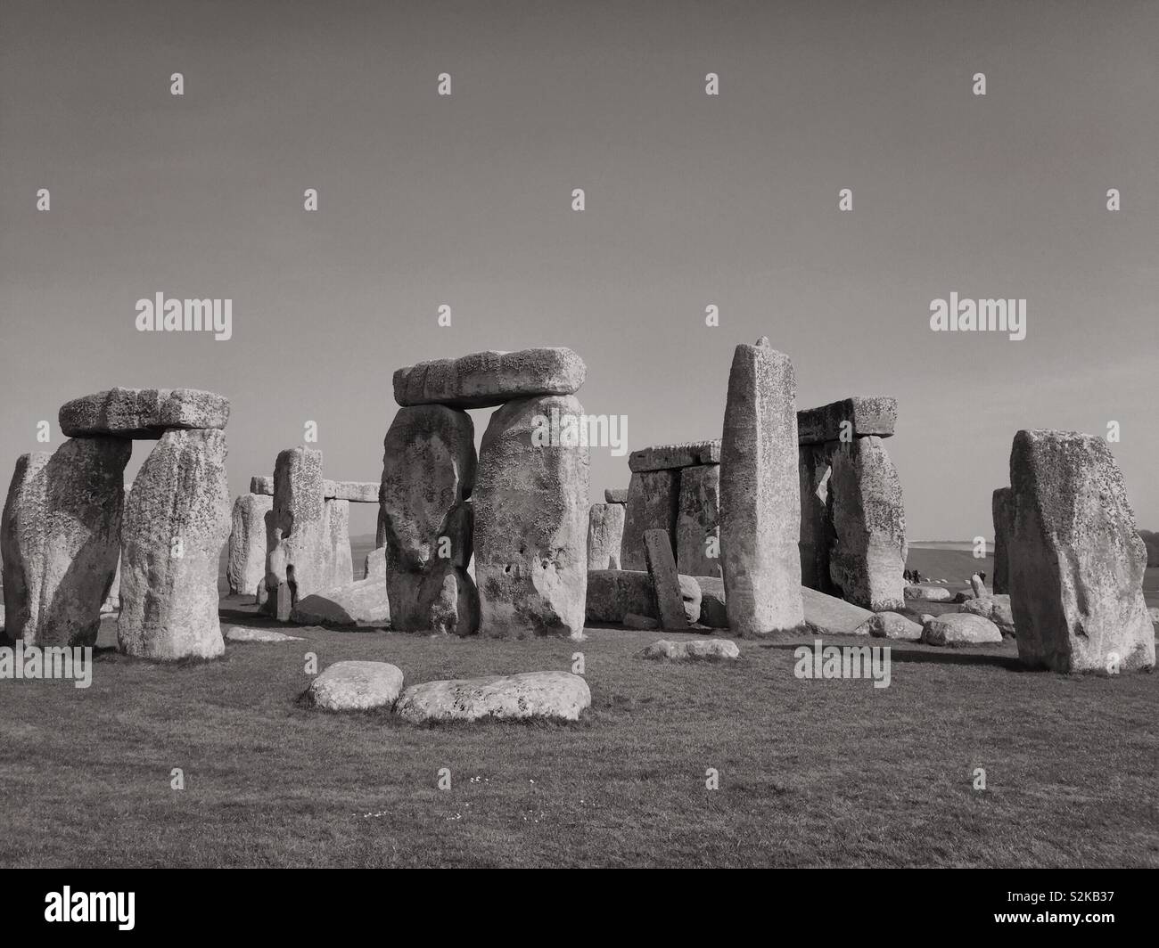 Black and white photo of Stonehenge.  Vintage photograph of English Heritage landmark and visitor tourist attraction monument in the UK - Smartphone Captured Stock Image