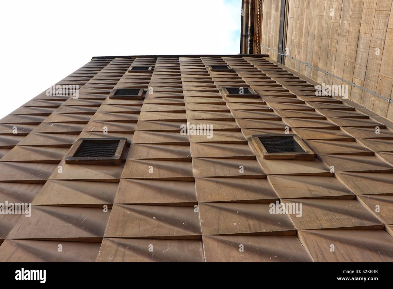 Abstract view of building facia stonework Stock Photo