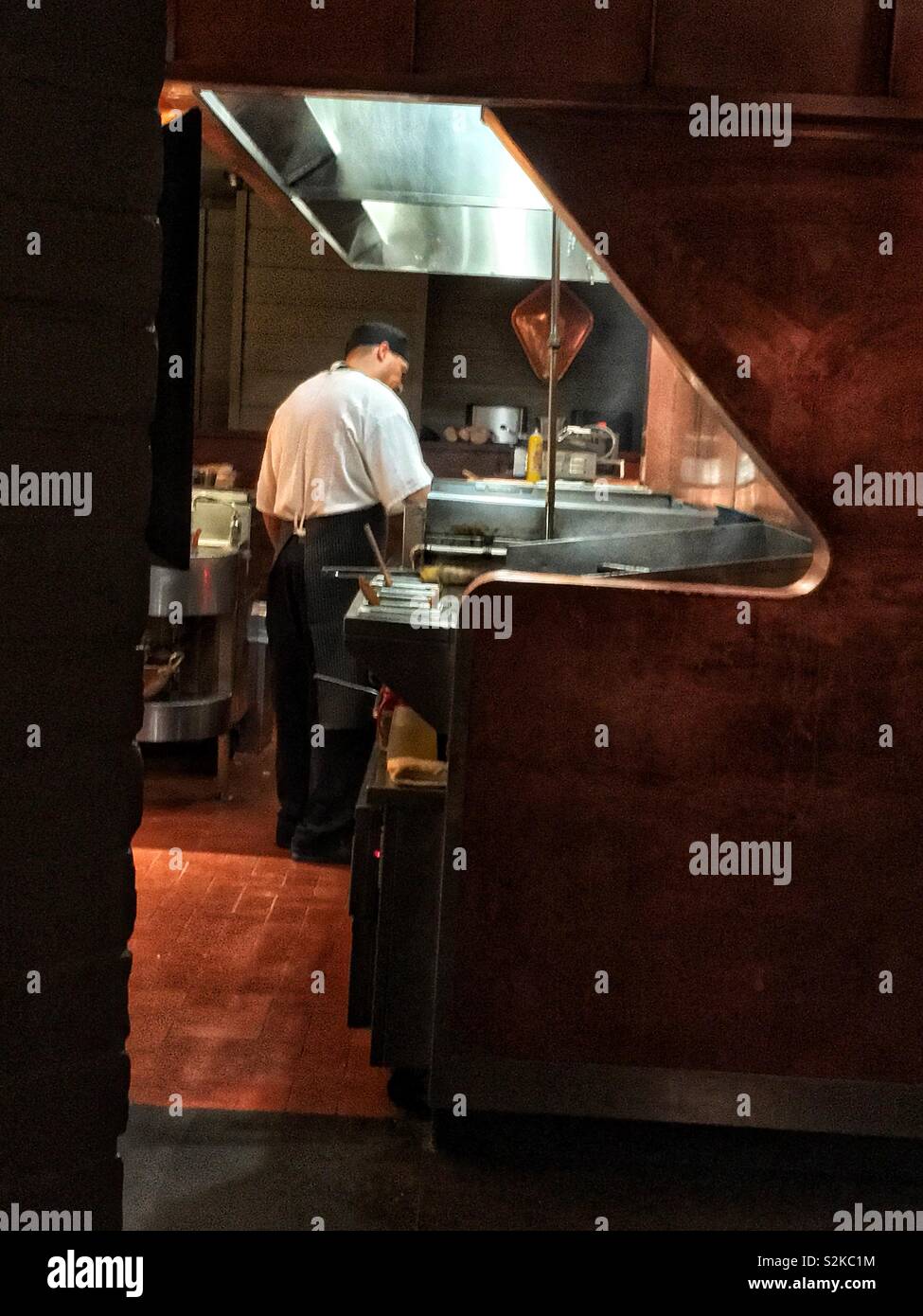 Chef cooking in the kitchen of a high end restaurant Stock Photo Alamy