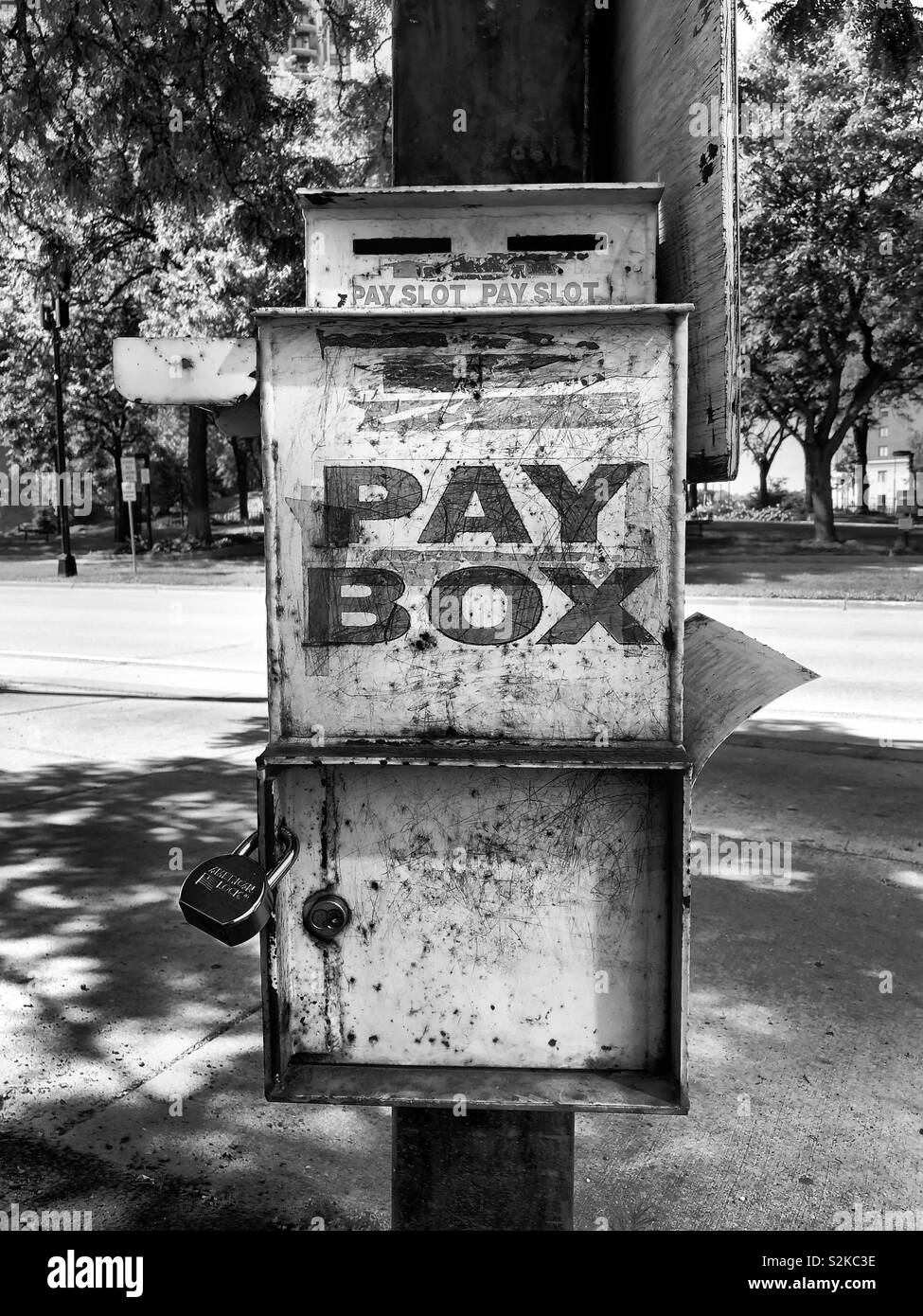 Old pay box in a parking lot. Stock Photo