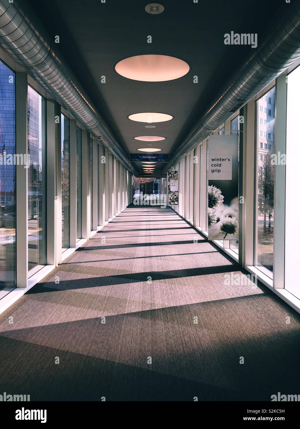 Light and shadows play in a hallway. Stock Photo