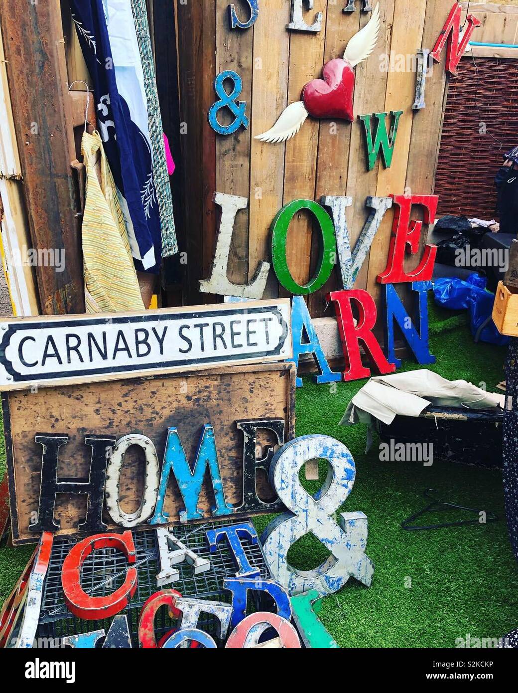 Signs at a flea market - Smartphone Captured Stock Image