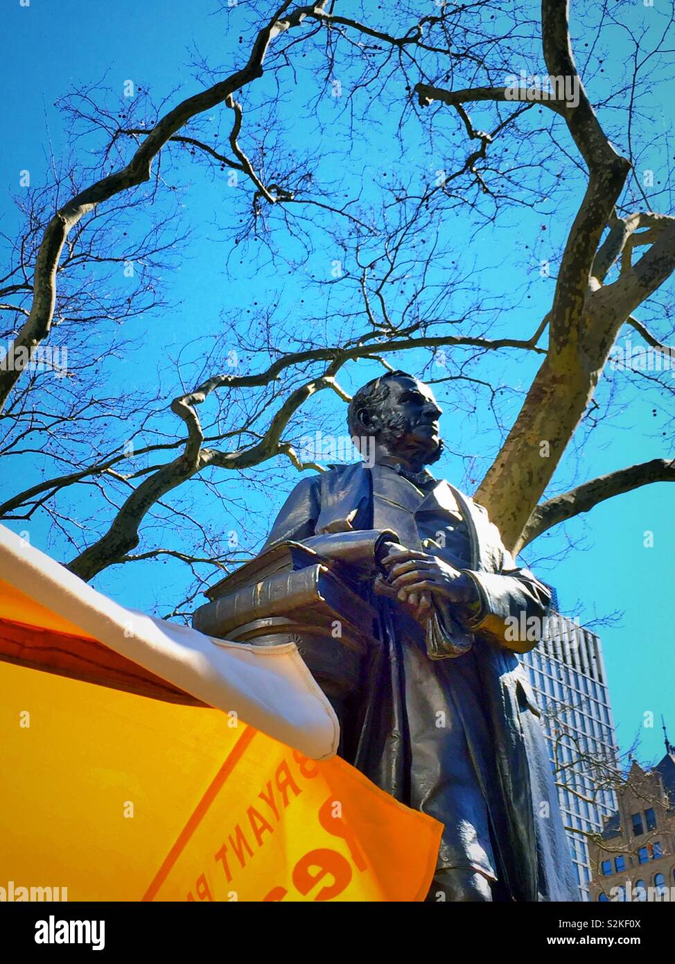 Bronze statue of William Earle Dodge in Bryant Park, NYC, USA - Smartphone Captured Stock Image