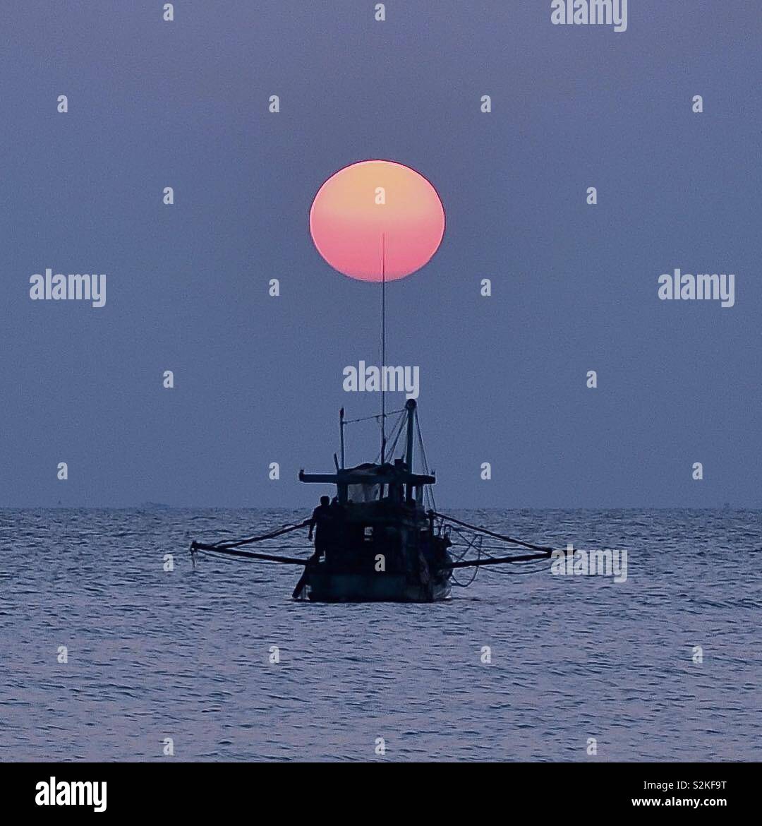 Sunset fishing Stock Photo