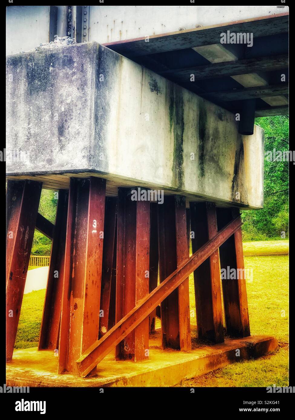 Concrete and iron beam supports for railroad tracks Stock Photo Alamy