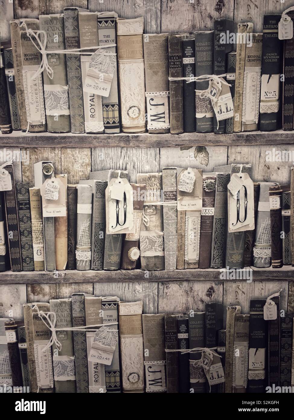 Wall covering made to look like shelves of old books. - Smartphone Captured Stock Image