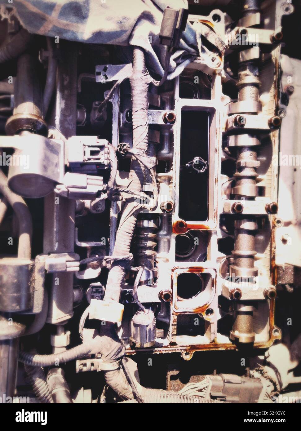 Details of car engine about to get maintenance due to motor oil