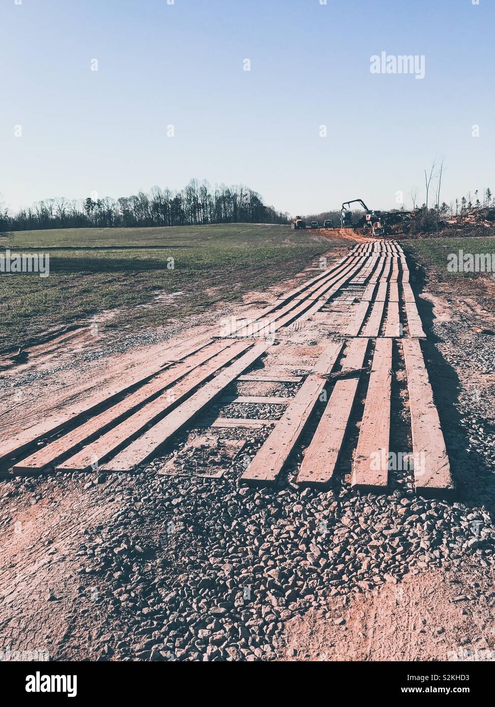 Timbers cover driving path for logging equipment in North Carolina - Smartphone Captured Stock Image