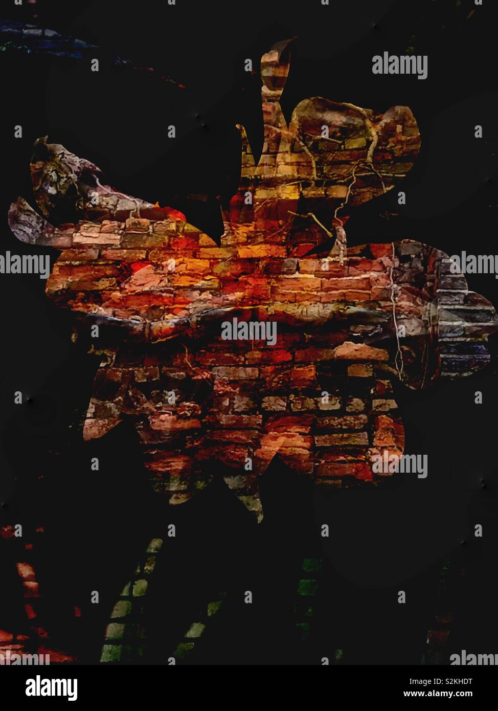 Silhouette of flower double exposed with brick wall - Smartphone Captured Stock Image