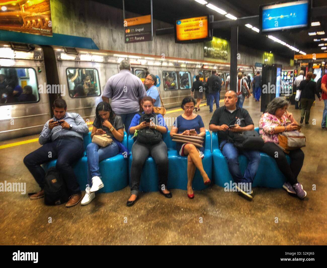 People waiting for the metro train at a station in Rio de Janeiro, Brazil. - Smartphone Captured Stock Image