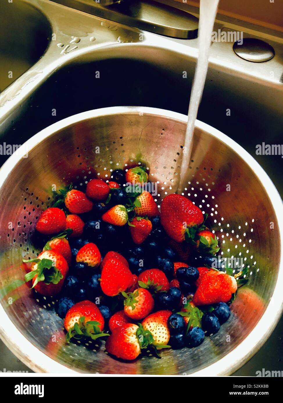 Berries in a colander Stock Photo