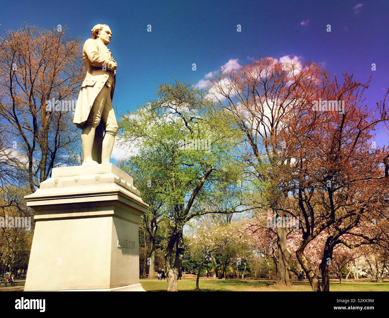 The granite standing figure of Alexander Hamilton is a monument in central park, New York City