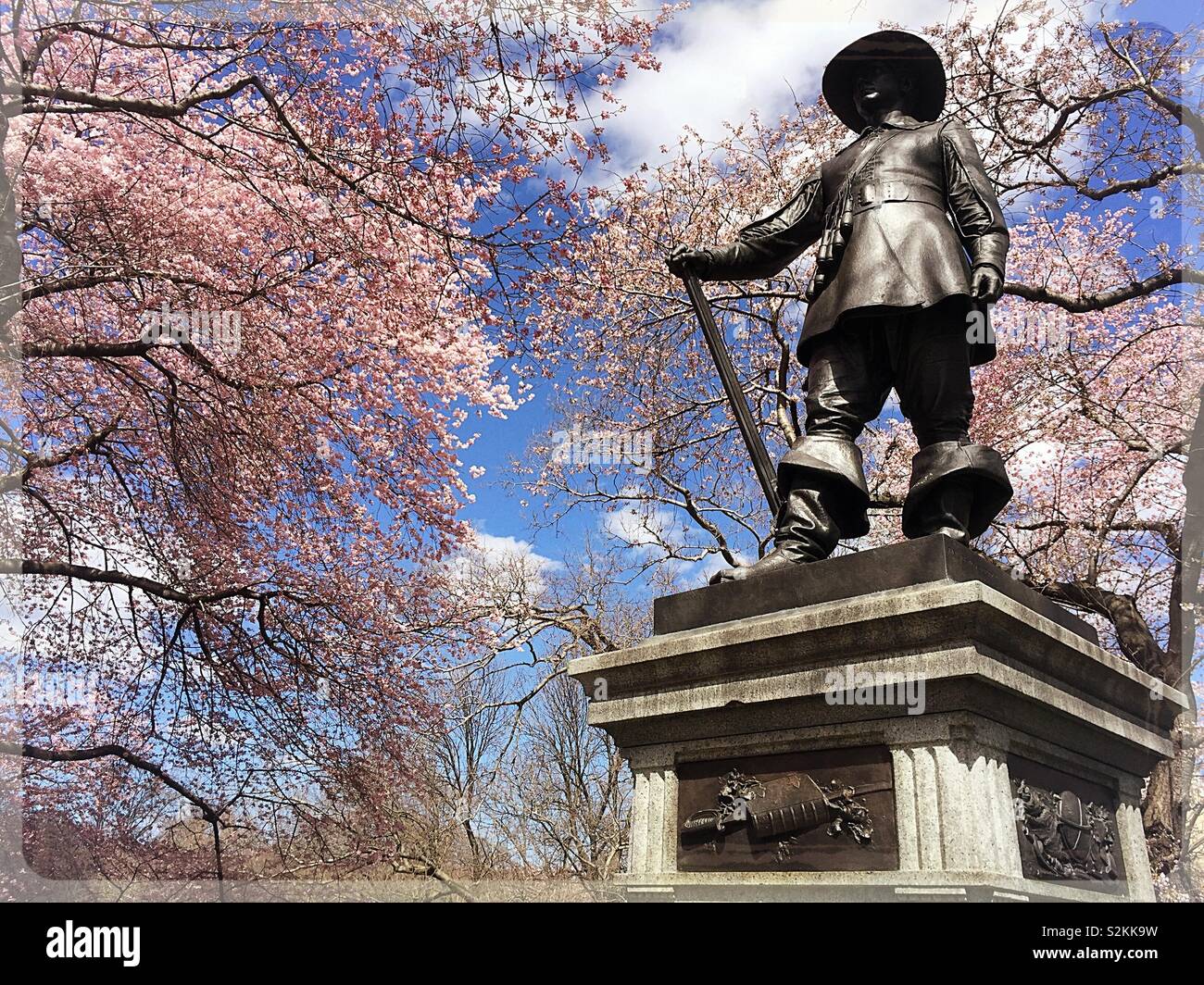 The pilgrims statue on Pilgrim hill in the spring time, Central Park, NYC, USA Stock Photo