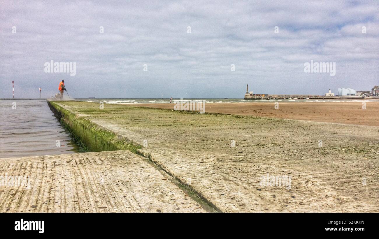 Tidal pool being cleaned ready for the summer season in Margate, Kent - Smartphone Captured Stock Image