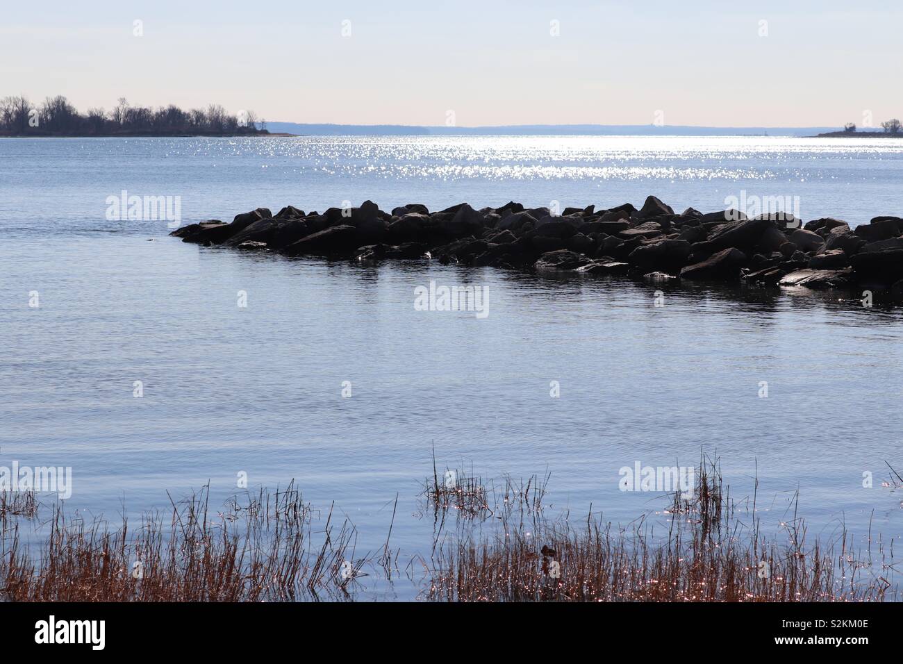 Outcrop of rocks overlooking Long Island Sound Stock Photo