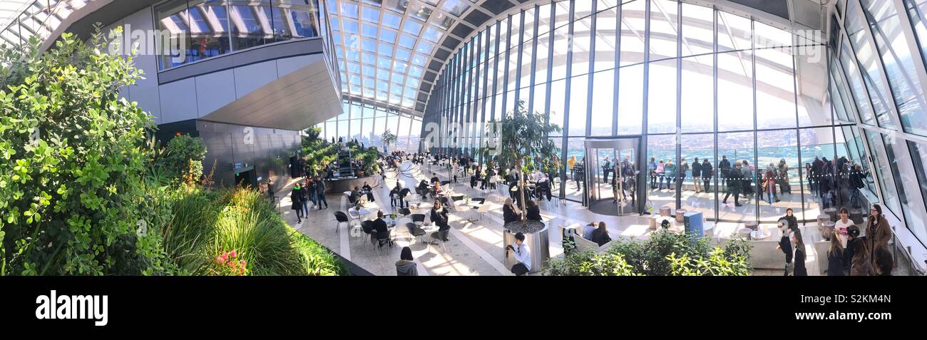 The Sky Garden or Skygarden viewing area and cafe at the top of 20 Fenchurch Street, London, England, United Kingdom. - Smartphone Captured Stock Image
