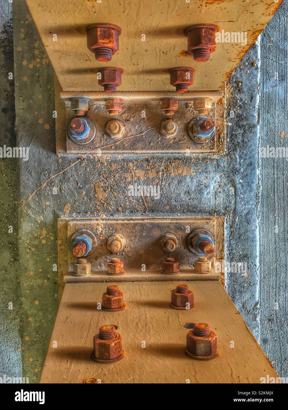 Aged and painted grimy Steel to concrete and column to foundation structural connection. - Smartphone Captured Stock Image