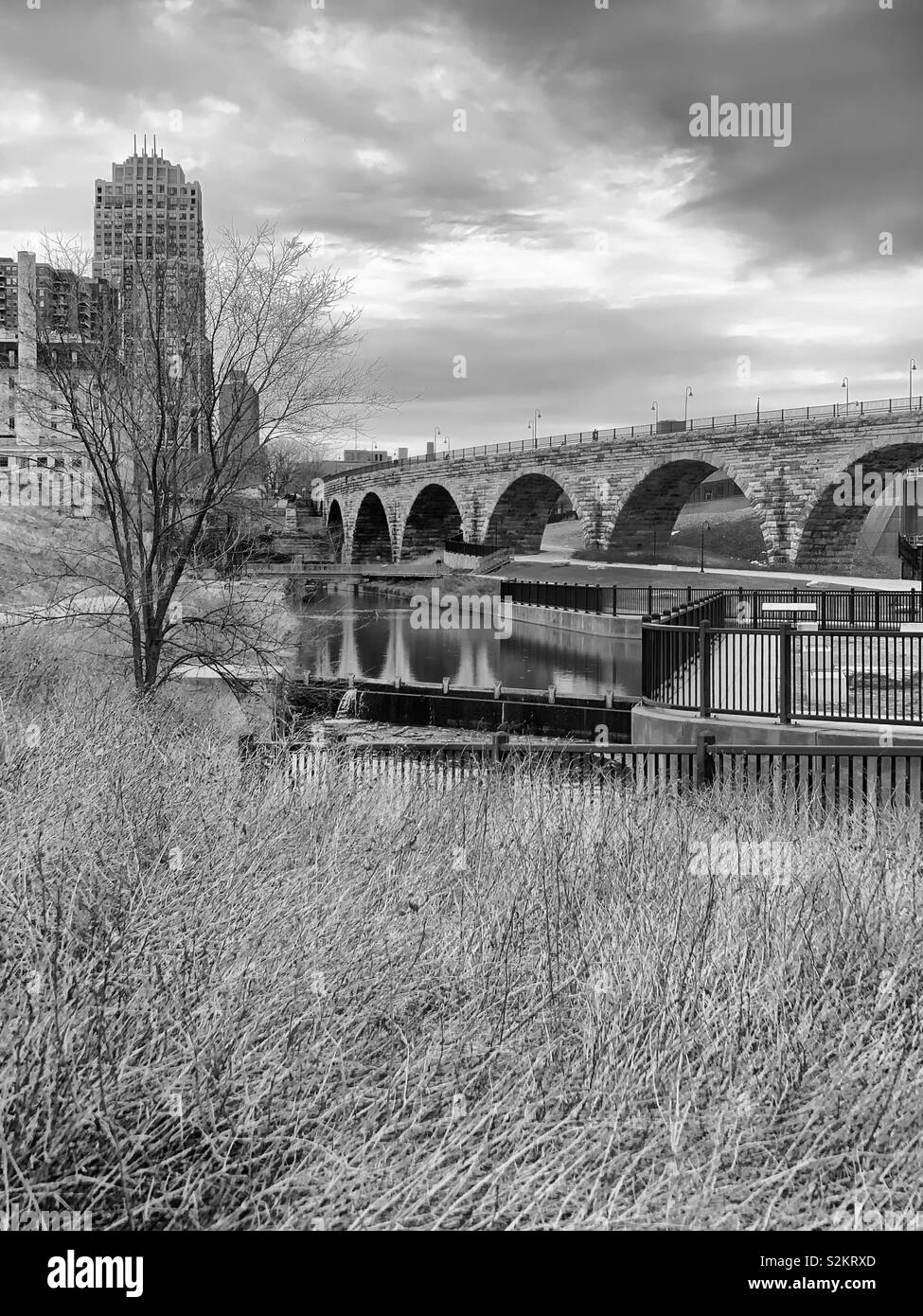 Winter grays give way to springtime in Mill Ruins park. Minneapolis,MN. Stock Photo