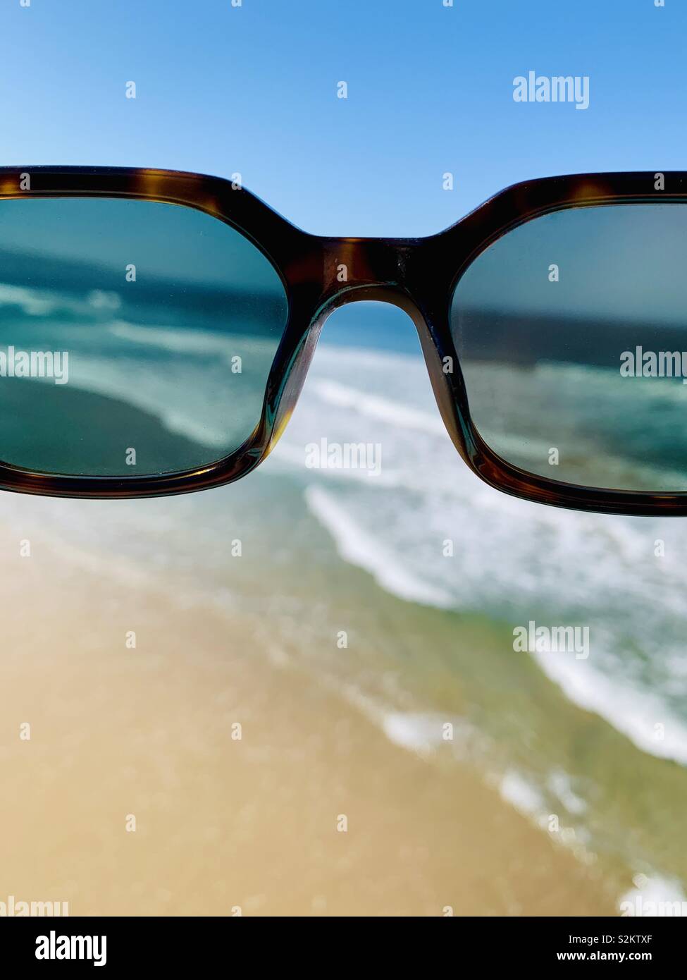 View of the beach on a sunny day through glasses.  Manhattan Beach, California USA. Stock Photo