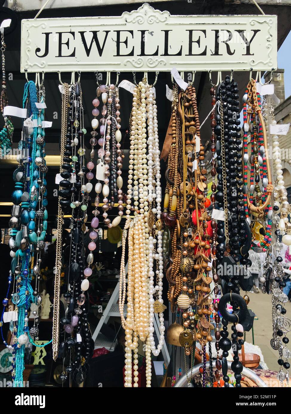 Jewellery at a flea market in Todmorden West Yorkshire England Stock Photo